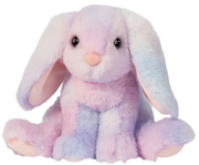 Soft plush bunny toy with pastel pink purple and white fur sitting upright