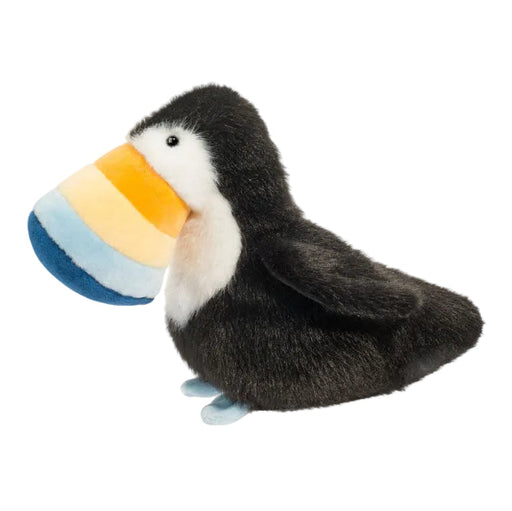 Black plush toucan stuffed animal with colorful rainbow striped beak on white background