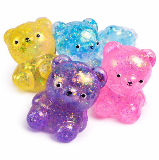 Five colorful translucent squishy bear toys with glitter in yellow, blue, purple, and pink
