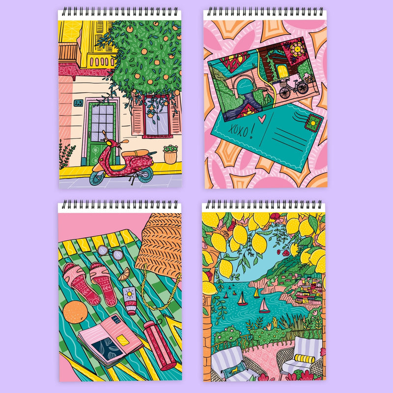Four spiral-bound FlowArt Color-to-Reveal notebooks with vibrant citrus coastline illustrated covers