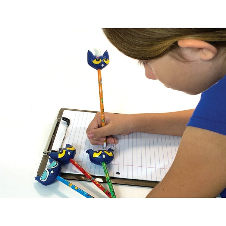 Child using Pete the Cat squishy top pens while writing on paper