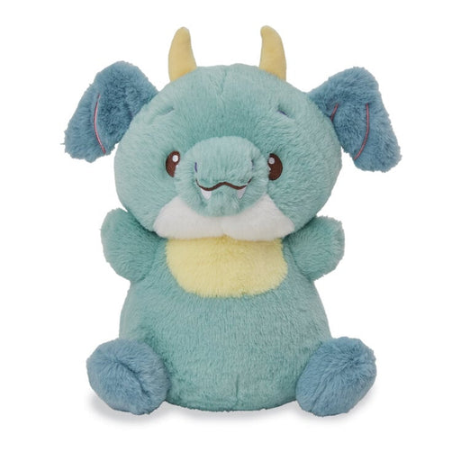 Teal dragon plush toy with yellow horns and belly, sitting pose