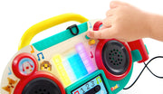 Child's hand pressing button on colorful Pixelz Sing-Along Boombox toy with light-up keys