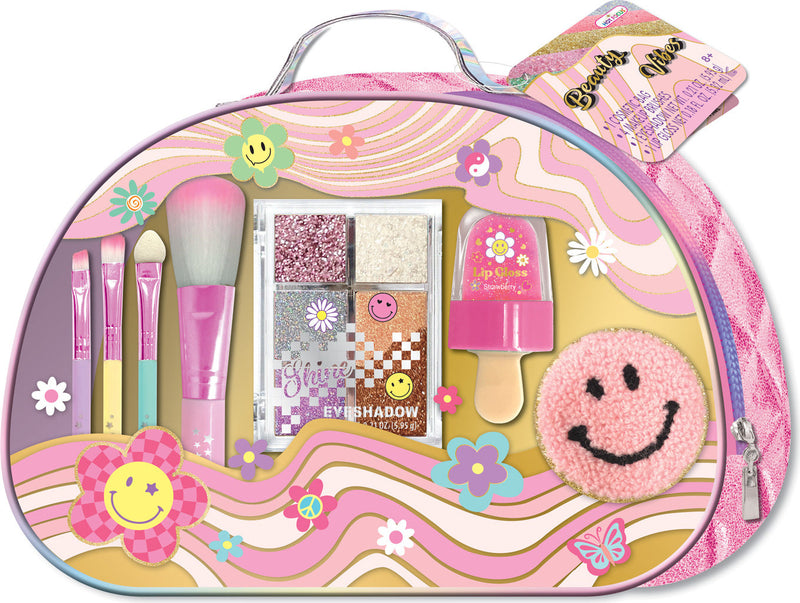 Pink groovy flower beauty bag with makeup brushes eyeshadow palette lip gloss and smiley face patch