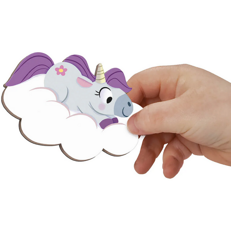 Hand holding magnetic unicorn piece from Magneti'Stories unicorn storytelling set