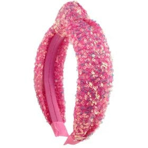 Pink sequined padded headband with sparkly textured surface on white background