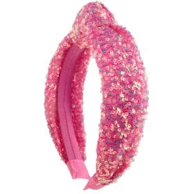 Pink sequined padded headband with sparkly textured surface on white background