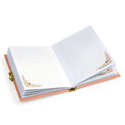 Open Djeco Tinyly Minico Secret Notebook showing lined pages with floral corner decorations
