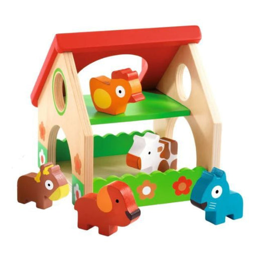 Colorful wooden farm house toy with farm animal figures on white background