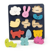Mentari Mood Board wooden puzzle with colorful emotion-themed shapes on dark background