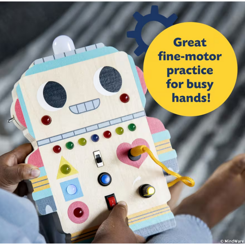 Child playing with colorful robot-shaped sensory board with buttons switches and fine motor activities