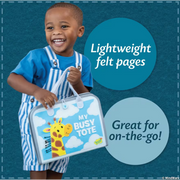 Child holding My Busy Tote featuring giraffe design with blue and white striped outfit