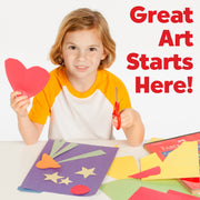 Child doing arts and crafts with colorful construction paper and scissors