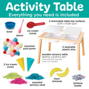 Activity sensory table with included accessories like bowls, spoons, pom poms, sand, and bins