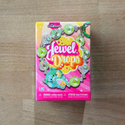 ORB Charmlets Jewel Drops bracelet with green and clear beads in retail packaging