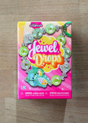 ORB Charmlets Jewel Drops bracelet package with colorful beads on pink packaging