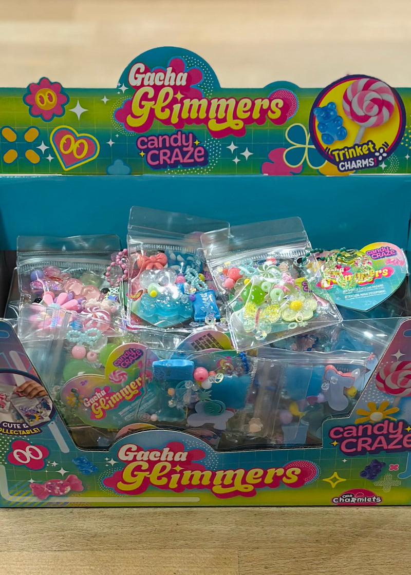 Gacha Glimmers Candy Craze toy set with multiple small collectible items in clear packaging