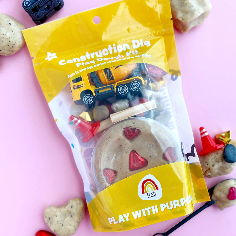 EGKD Construction Dig playdough kit with truck toy and heart-shaped dough on pink surface