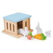 Wooden rabbit hutch toy set with blue roof, white rabbits and vegetables