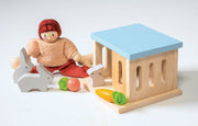 Mentari wooden rabbit hutch toy set with doll figure and toy rabbits on white background