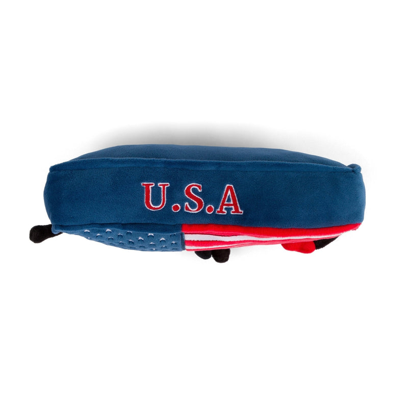 Blue plush keychain shaped like USA with red embroidered U.S.A text on white background