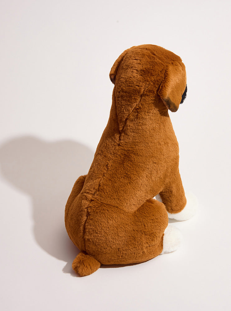 Brown plush Boxer dog stuffed animal sitting on white background