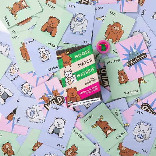 Moose Match Mayhem card game with scattered animal cards showing bears squirrels yeti and moose.