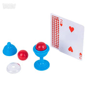 Magic trick set with blue cups, red balls, clear disc and playing card