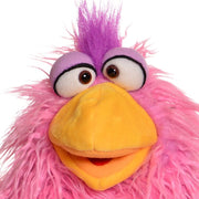 Pink furry puppet with purple hair tuft, orange beak, and large googly eyes