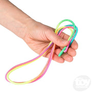 Hand holding colorful Chinese jump rope showing rainbow elastic cord loops