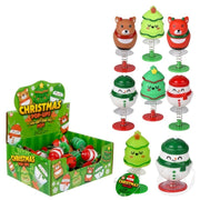 Christmas Pop-Ups toy set showing colorful spring-loaded characters including snowmen, bears, and Christmas trees