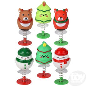 Six Christmas-themed pop-up toys featuring bears, trees, and snowmen with spring bases
