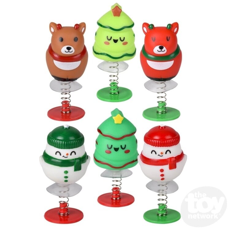 Six Christmas-themed pop-up toys featuring bears, trees, and snowmen with spring bases