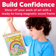 Child holding completed paint by number artwork featuring sweets rainbow and sun design