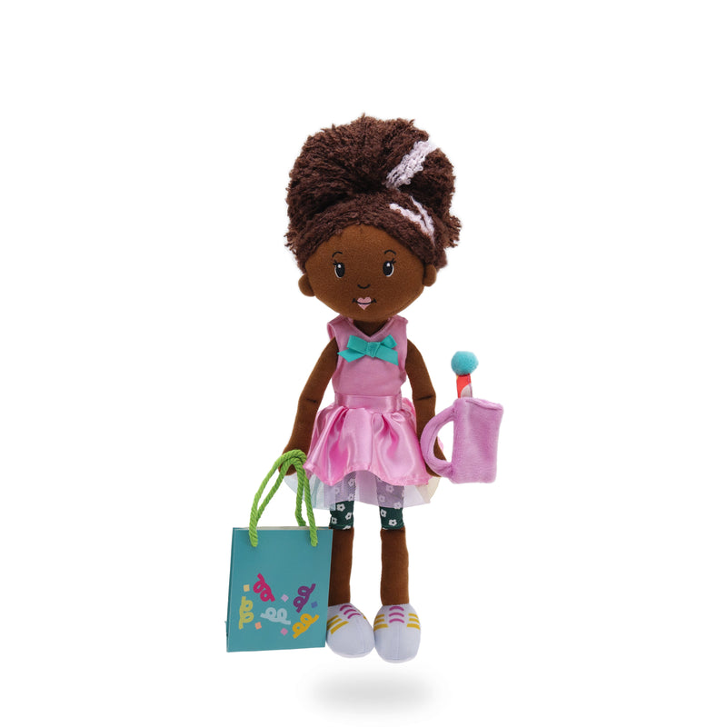 Groovy Girls Party Perfect doll in pink dress holding gift bag and party favor