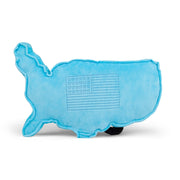 Blue USA-shaped plush pillow with embroidered American flag design on clean white background