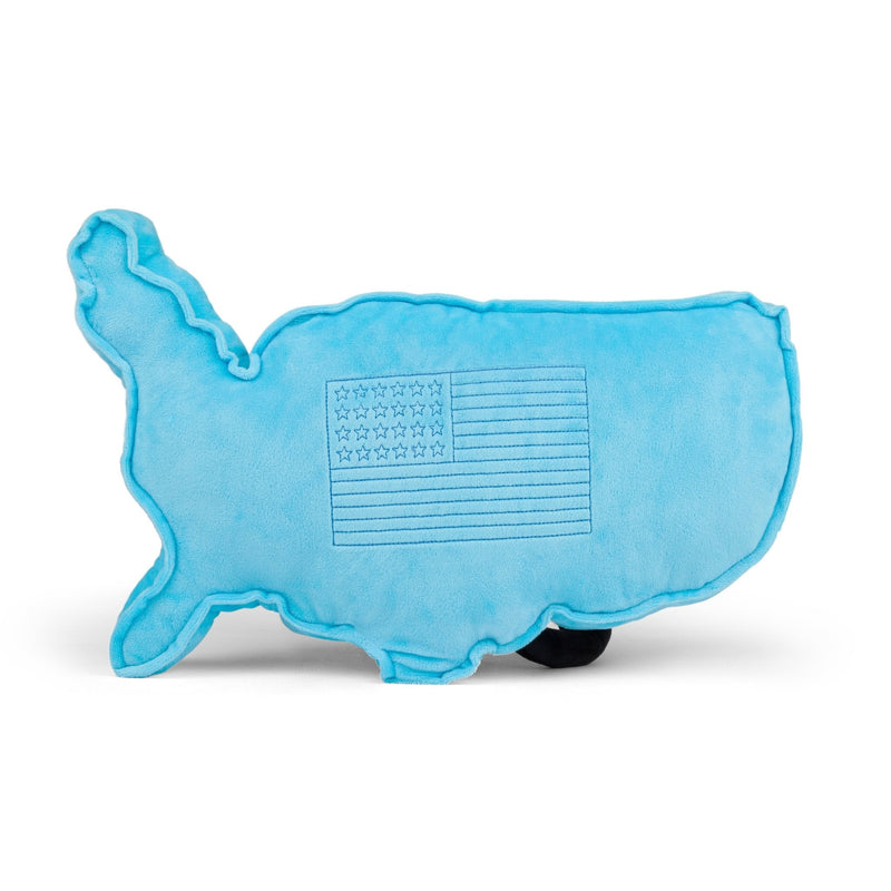 Blue USA-shaped plush pillow with embroidered American flag design on clean white background