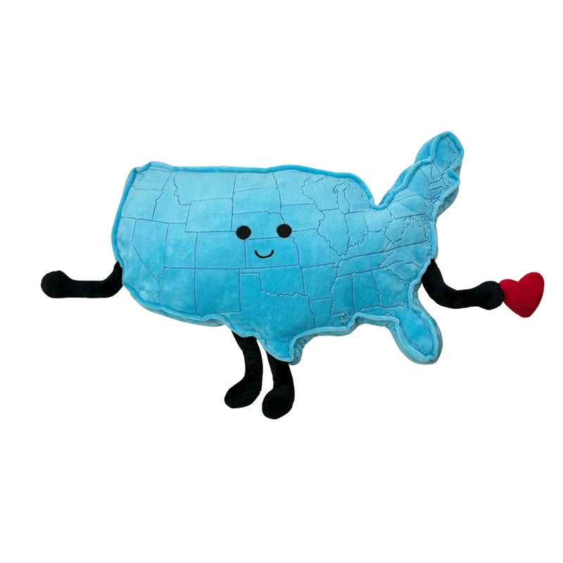 Blue plush toy shaped like USA map with cute face, arms, legs, and red heart
