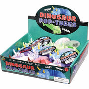 Display box of colorful Dinosaur Pop-Tubes toy collection showing multiple pop tubes
