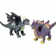 Two dragon toy figures with spikes and detailed features on white background