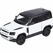 White diecast Land Rover Defender 90 model with black roof on white background
