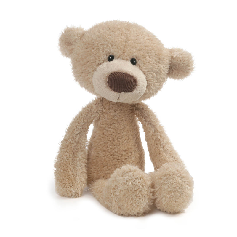 Beige plush teddy bear with soft fuzzy texture and brown corduroy nose