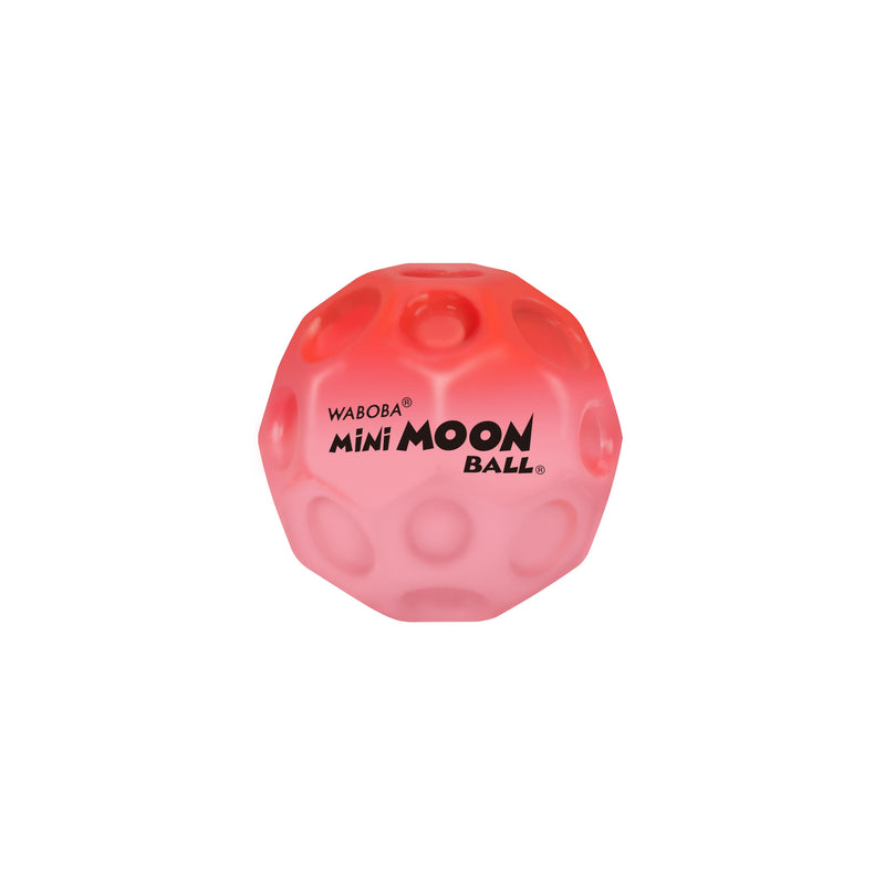 Red Waboba Mini Moon Ball with crater-like textured surface on white background
