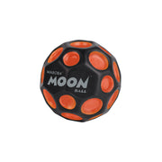 Waboba Moon Ball black with orange crater spots on white background
