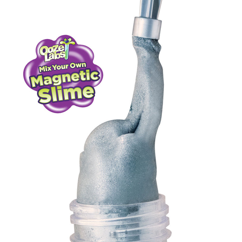 Close-up of metallic blue-gray magnetic slime being pulled from container with mixing tool