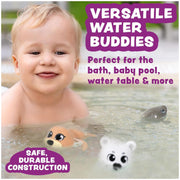 Baby playing with wind-up swimming arctic animal toys in water