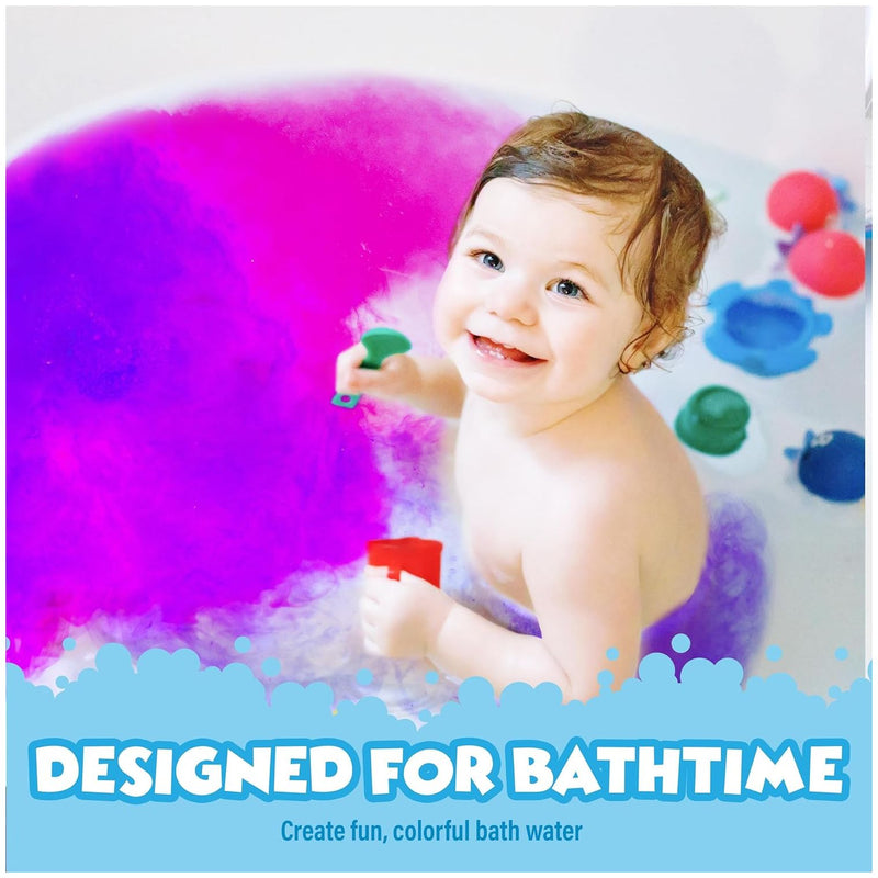 Happy toddler in colorful bath with purple fizzing water and bath toys